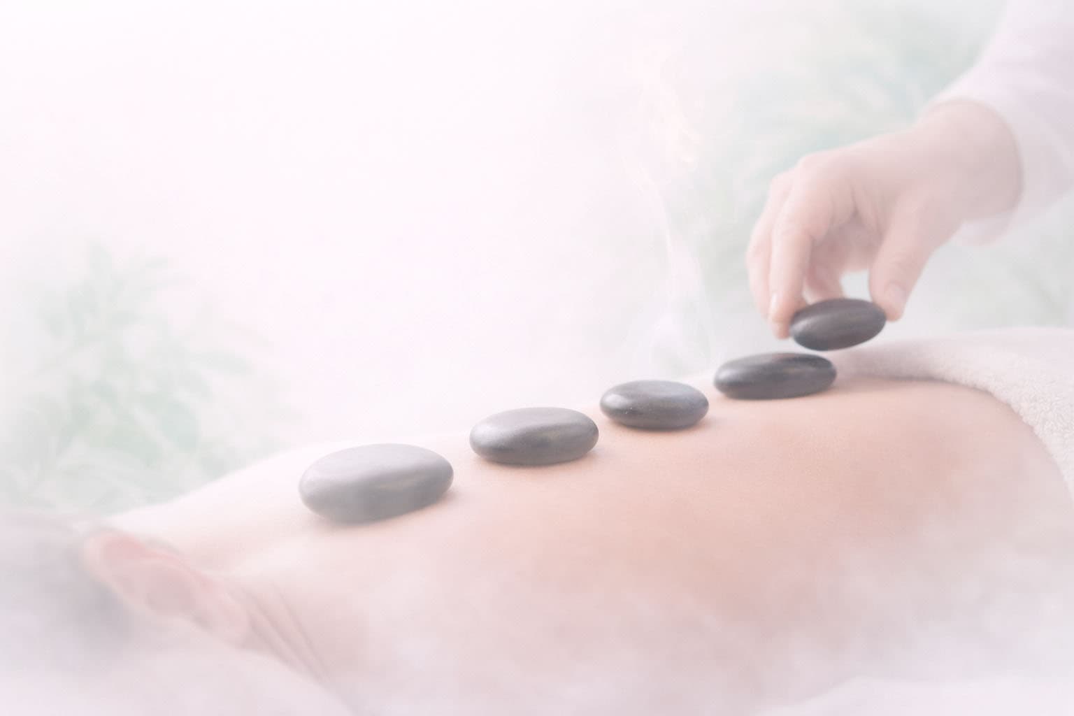 Massagem com Pedras Quentes
